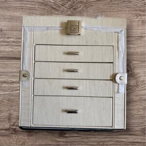 Jewelry Box 4 drawer with locking top compartment for watches 
Cream NWT
